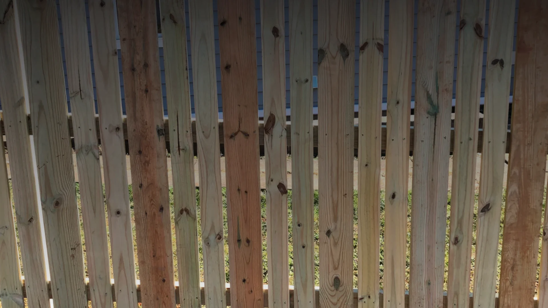 wood fence installed fixed